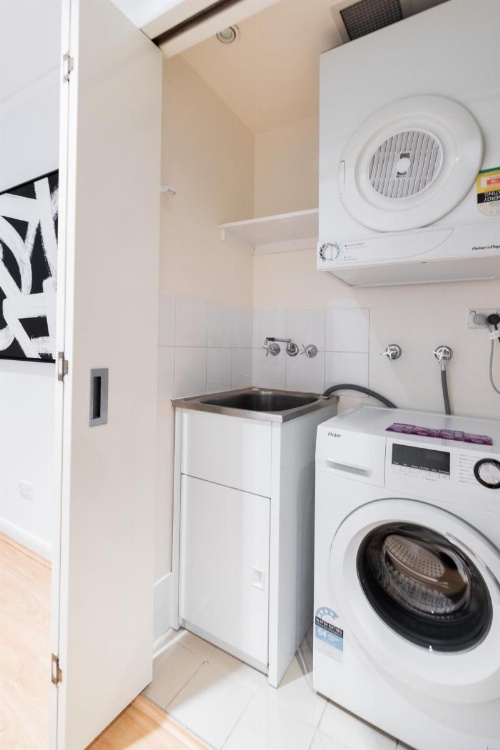 Sleek modern apartment close to everything image 15