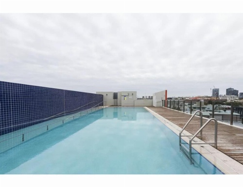 Sleek modern apartment close to everything image 2