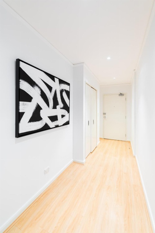 Sleek modern apartment close to everything image 4